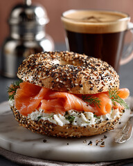 Bagel with cream cheese, smoked salmon, dill and coffee