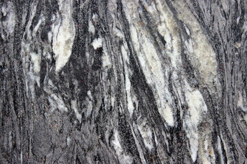 Close-up of rough rock surface with natural crack