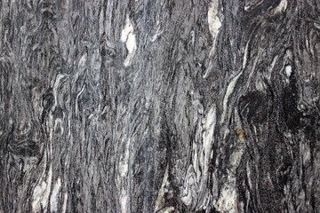 Close-up of rough rock surface with natural crack
