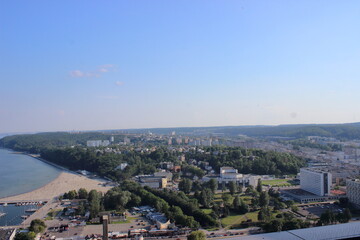 Fototapeta premium Panoramic view of Gdynia city and beach on Baltic Sea coast on sunny day