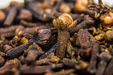 Macro Closeup dry organic raw clove shot, spices culinary material, healthy food, freshness aromatic flavor, mockup graphic design high quality, selective focus, shallow depth of field, Cairo Egypt