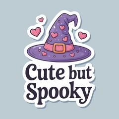 A cartoon image of a witch hat decorated with hearts and the words cute but spooky below it