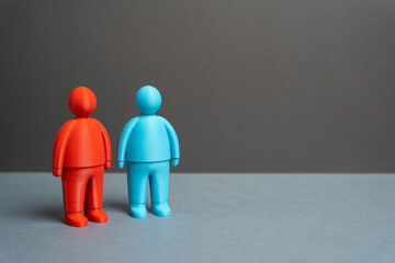 Two people with opposing political views, values, and visions. The differences and dissimilarities of two competing sides. Ideological confrontation and polarization. Political analysis, elections