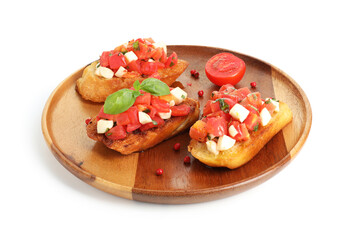 Tasty bruschettas with tomatoes, mozzarella cheese and basil isolated on white