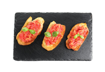 Tasty bruschettas with tomatoes and basil isolated on white, top view