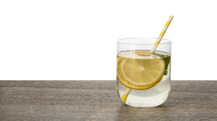Refreshing water with lemon and mint in glass on wooden table against white background