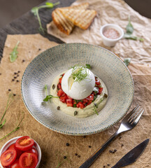 Burrata cheese resting on hummus