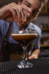 Freshly mixed espresso martini cocktail