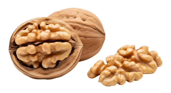 Closeup of walnuts, one whole and one halved, with a small pile of shelled nuts isolated on transparent background