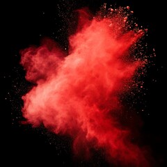 Vibrant red powder explosion against a dark background