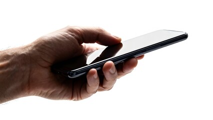 Hand holding a modern black smartphone with a blank screen against a on transparent background