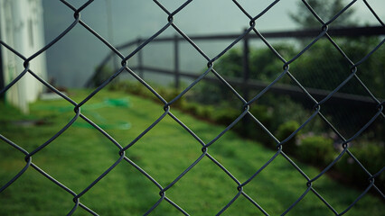 Green Chain Link Fence Wire Mesh Pattern Metal Security Barrier Background
