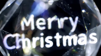 "Merry Christmas" Text Engraved Inside Spinning Crystal Macro - Powered by Adobe