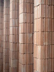 Red bricks for building in construction site for background.