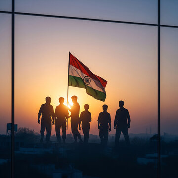 Indian Soldiers Holding the Flag of India at Sunset