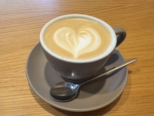 Close-up view of cup of cappuccino on the table in a cafe