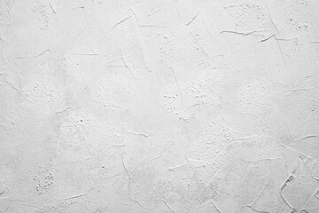 White grey  plaster wall with light texture and subtle shadow details