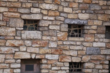 Fototapeta premium Old stone house wall