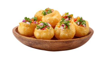 A plate of small yellow dumplings with onions and other vegetables