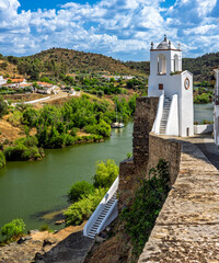 View of Mértola and its clock tower by the Guadiana River