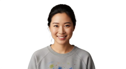 A smiling 28-33-year-old East Asian freelance illustrator, wearing a cozy, paint-stained sweatshirt, perfect for creative industry profiles, winter campaigns, or educational content.