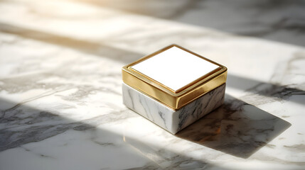 Gold box on marble surface

