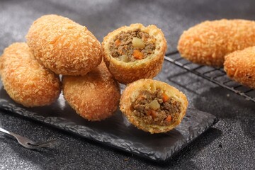 Curry Bun or Kare Pan, Japanese curry bun filled with vegetables and minced meat cooked with curry spices