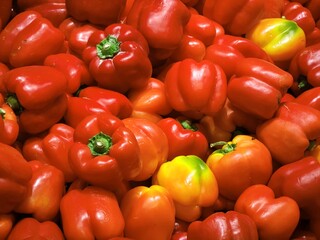 fresh red and yellow bell peppers texture colorful healthy vegetable background