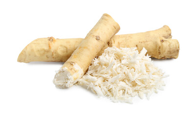 Whole and grated horseradish roots isolated on white