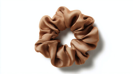 Elegant and sophisticated scrunchie displayed against a clean backdrop. The scrunchie is crafted from a luxurious, lustrous fabric
