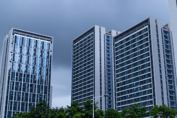 High-rise buildings on cloudy days
