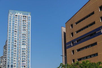 High-rise buildings against the backdrop of a blue sky