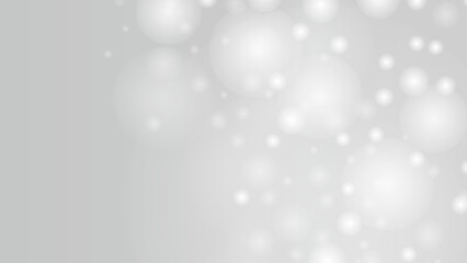 光の粒がきらめきながら漂う幻想的で優雅な抽象背景イメージ