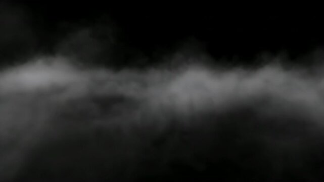 A mysterious layer of white and grey smoke or fog drifts across a dark, undefined background.