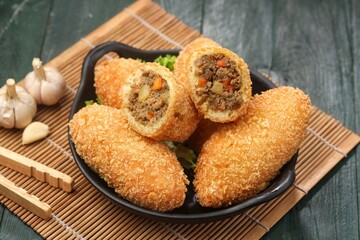 Curry Bun or Kare Pan, Japanese curry bun filled with vegetables and minced meat cooked with curry spices