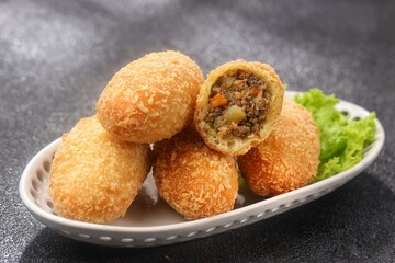 Curry Bun or Kare Pan, Japanese curry bun filled with vegetables and minced meat cooked with curry spices