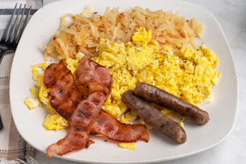 scramble eggs  with bacon  and sausage