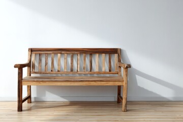 Rustic wooden seating furniture rests against a bright white wall in an indoor setting