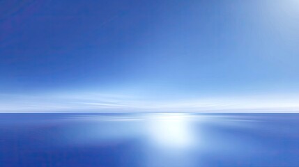 Obraz premium Vast Tranquil Ocean View Under Clear Blue Sky with Gentle Horizon and Soft Cloud Coverage Displaying Peaceful Calmness and Natural Serenity