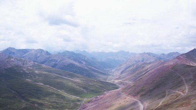 Sweeping aerial of winding roads and vast peaks near Babusar Pass in Naran-Kaghan Valley. Pakistan