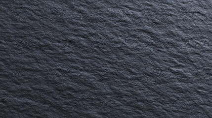 Textured Background of Dark Grey Slate Stone Surface with Subtle Variations and Natural Patterns Ideal for Design and Decorative Applications