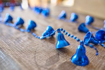 Chain of plastic blue bells and beads to decorate the house and the Christmas tree during the holidays