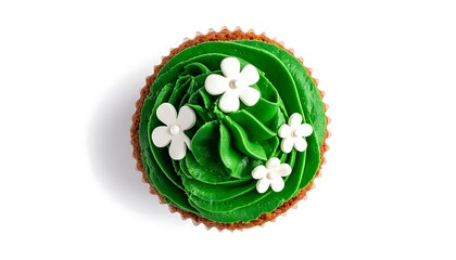 Top-down view of a single cupcake. Its green frosting is swirled, adorned with white flower-shaped sprinkles. Baked in a brown paper cup