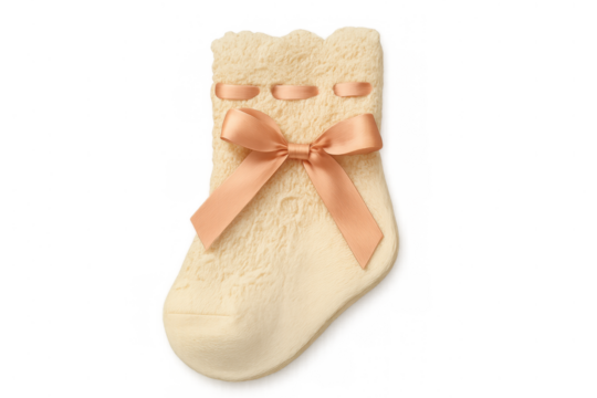 Soft cream baby sock with peach ribbon bow representing newborn care, comfort, and infancy, transparent background