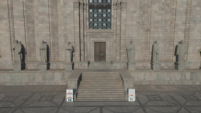 25.02.2025 Drone footage Matenadaran in Yerevan, Armenia. Iconic Matenadaran Library in Armenia, Caucasus. Drone flies out from the entrance of Matenadaran in Yerevan, Armenia.
Historic stone building