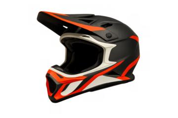Black and orange full-face motocross helmet providing head protection for extreme sports, isolated on transparent background