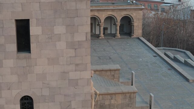  Aerial view of the Matenadaran in Yerevan, Armenia. Drone fky around matenadaran building.  Iconic Matenadaran Library in Armenia, Caucasus.