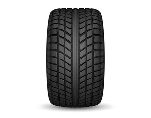 A close-up front-view of a black, grooved tire. The grooves run vertically, showcasing the tire's tread. It sits on a white background