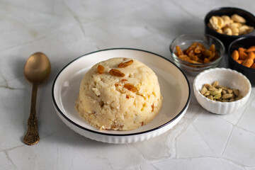 Suji ka halwa is a traditional Indian dessert made from semolina, ghee, sugar, and nuts, offering rich, sweet, aromatic flavor.
