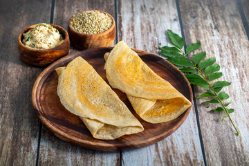 Bajra dosa is a healthy South Indian crepe made from pearl millet, crisp outside, soft inside, rich in fiber and nutrients.
